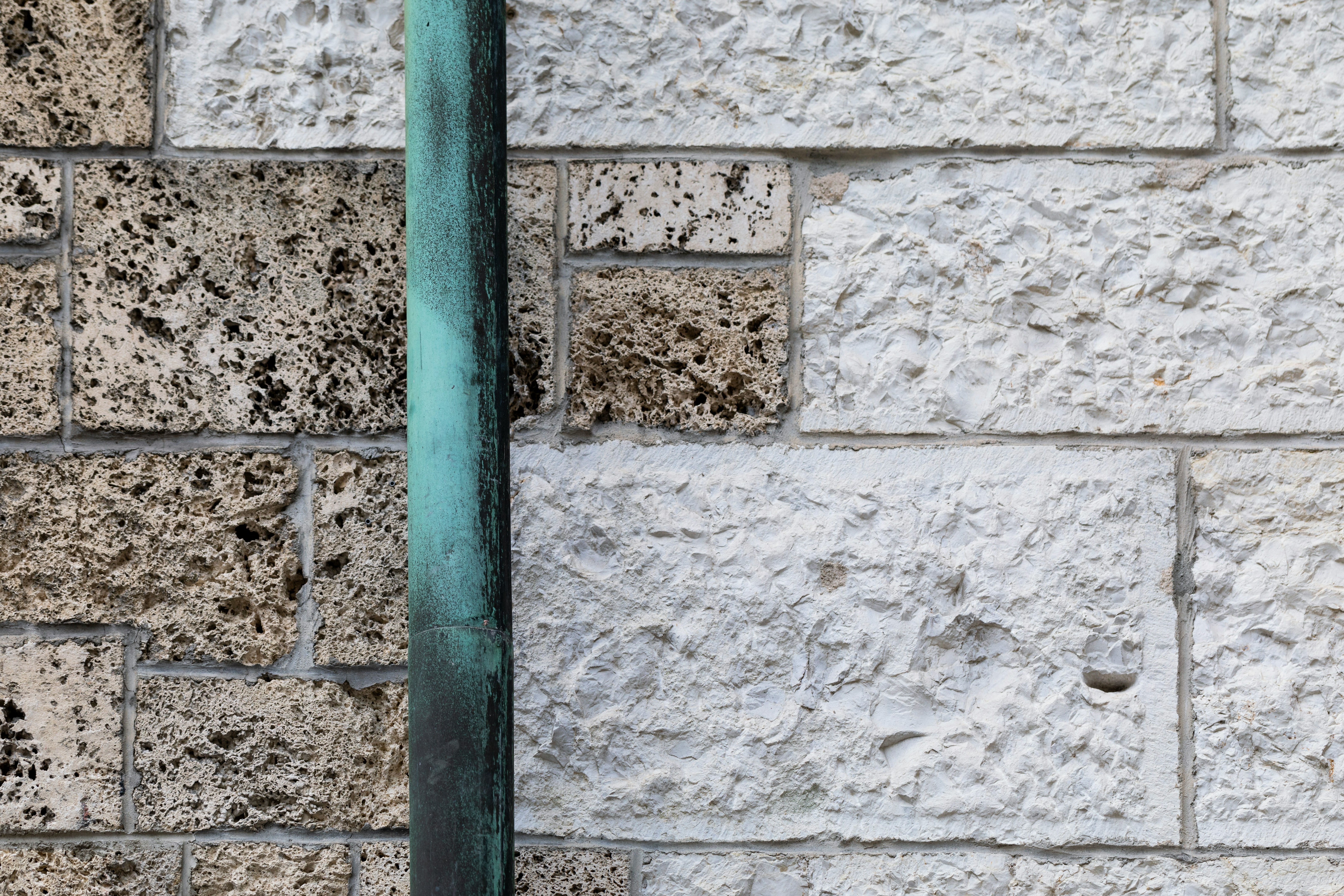 white and brown wall bricks